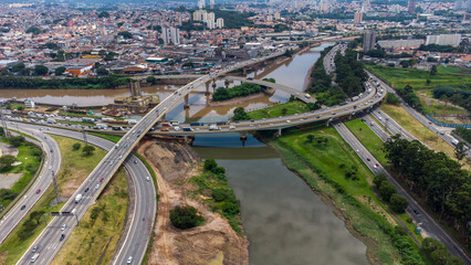 aerial view of Complexo do Cebolão is a set of bridges and viaducts in the region where the Tietê and Pinheiros rivers meet, in the city of São Paulo, Brazil. View from the bridges.

