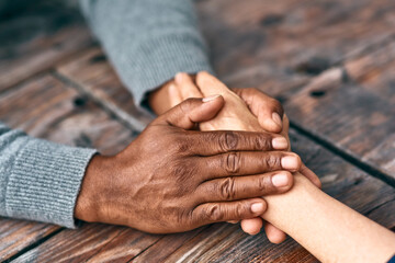 Im here to support you. Cropped shot of two unrecognizable people holding hands.