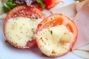 Tomatoes stuffed with cheese from the oven