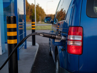  a gas nozzle of a compressed natural gas CNG powered car