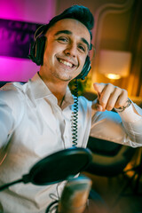 Self portrait of man caucasian male content creator with headphones