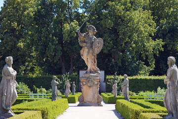 Castle garden full of statues.
