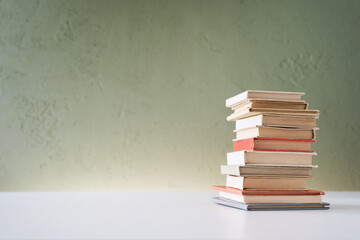 Stack of mini old books.