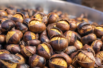 Roasted sweet chestnuts close up. Organic food. Food background. Healthy eating