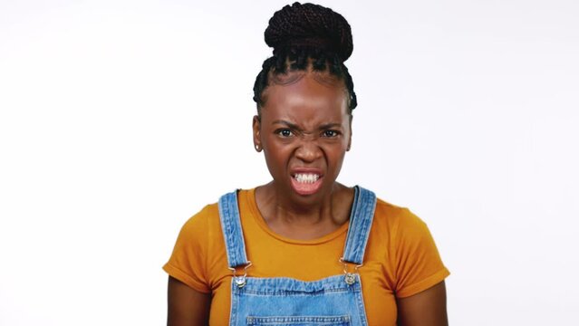 Angry, shouting and frustrated with face of black woman for stress, mad and mental health. Pressure, emotional and rage with girl screaming for hate, expression and furious in white background