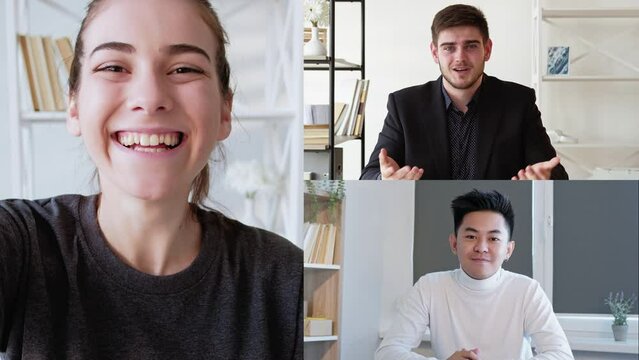 Group video meeting. Web call. Online communication. Cheerful excited enthusiastic diverse business colleagues speaking online at virtual office.