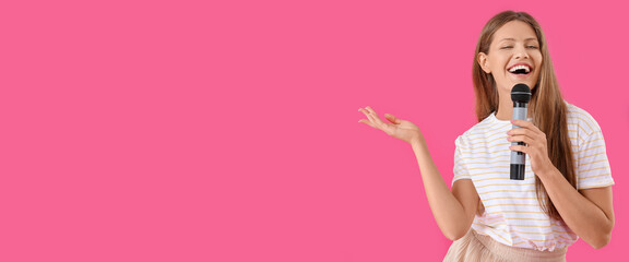 Beautiful young female singer with microphone on pink background with space for text