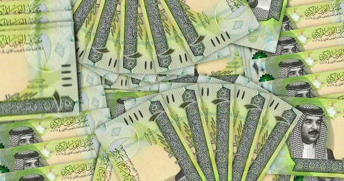 Bahrain Dinar banknotes in a cash fan mosaic pattern loop. Bahraini 10 BHD notes. Abstract concept of bank, finance, economy seamless and looped decorative design background.