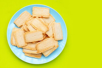 Cheese crispies on green background