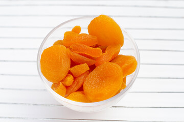 Dried apricots on white background.