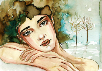 Fantasy portrait of a woman against the background of a winter landscape.