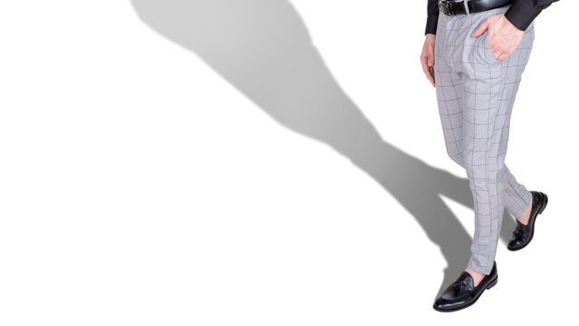 Man's legs in elegant trousers.