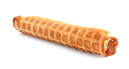 Delicious wafer roll with boiled condensed milk isolated on white background