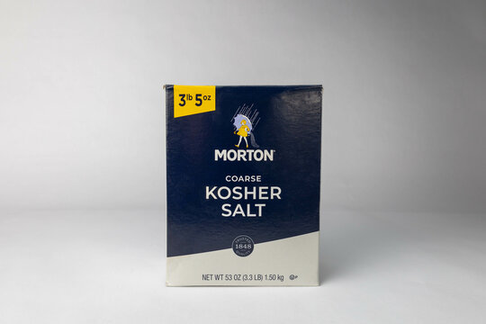 Fort Myers, FL , USA - 3-1-23: A Box of Morton Coarse Kosher Salt isolated on a white background. 