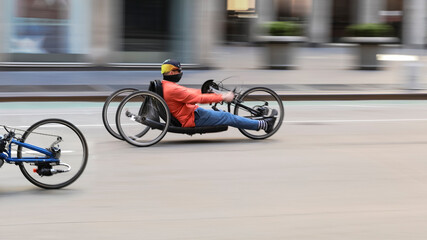 Tricycle on a city street in motion