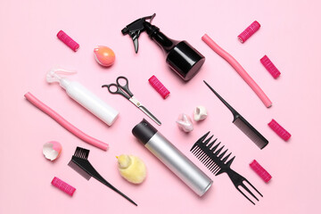 Hairdresser's tools with Easter rabbits and chicken on pink background
