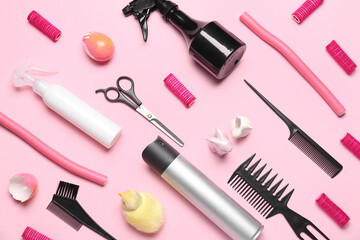 Hairdresser's tools with Easter rabbits and chicken on pink background