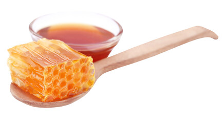 Honey comb with honey in a glass bowl