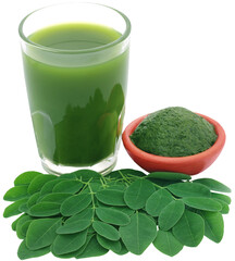 Moringa leaves with extract in a glass