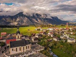 Fototapeta na wymiar Aerial view Oberperfuss town in Tirol Austria by drone. Alps.