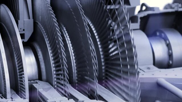 Close up of balancing steam turbine spinning rotor. Media. Industrial background with spinning fast mechanism.