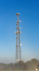 Radio tower antenna with blue sky in the morning