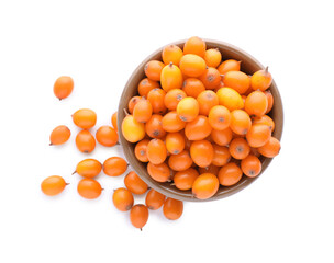 Fresh ripe sea buckthorn berries in wooden bowl isolated on white, top view