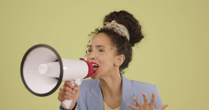 Megaphone, motivation and announcement with a black woman in studio on a green background for a protest or demonstration. Speech, freedom and human rights with a female activist at a government rally