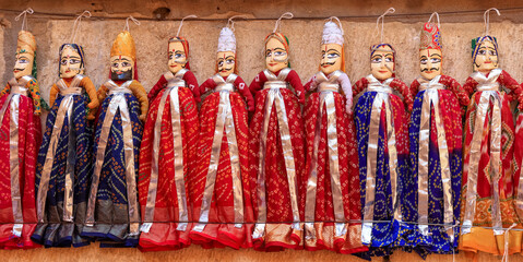 Panoramic view of colorful several Rajasthan style puppets for sale in Jaisalmer, Rajasthan, India.
