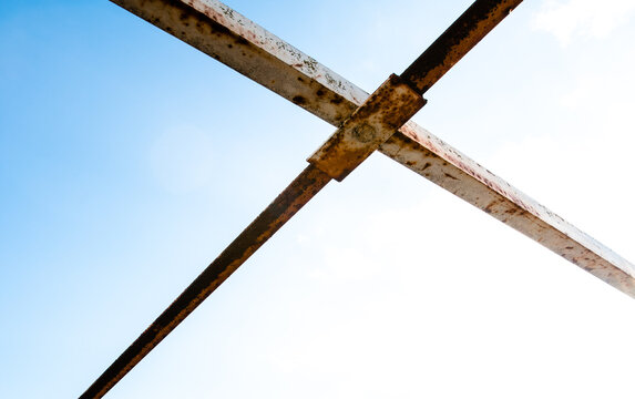Rusted steel framing of pedestrian bridges of Mopac Expressway in Austin TX USA