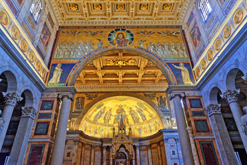 Fototapeta na wymiar Basilica of Saint Paul Outside the Walls. Famous apse mosaic of Jesus Christ Pantokrator from1220, Rome, Italy