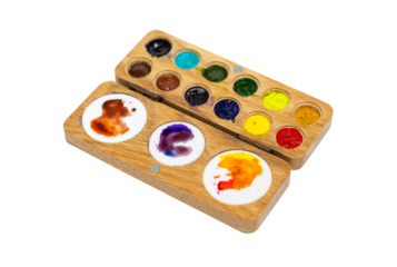Wooden watercolor palette. Watercolor tray with watercolor set isolated on a white background.