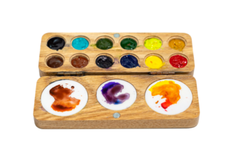 Wooden watercolor palette. Watercolor tray with watercolor set isolated on a white background.