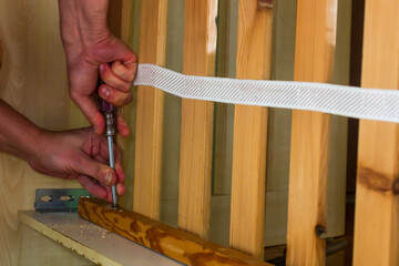 Assembly of the bed with a screwdriver