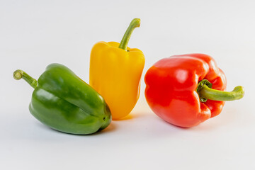 three bell peppers isolated on white background