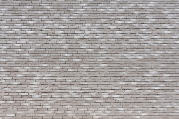 Gray brick wall texture background, stone Facade wall of a new house
