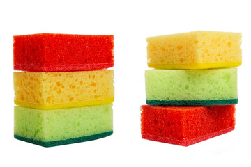 Multi -colored sponges for washing dishes on each other. Devices for cleaning the house, cleanliness and health. Isolated on a white background. Close-up.