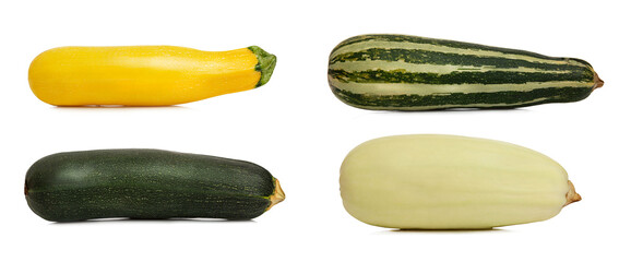 Zucchini of different varieties, shapes and size. Green, striped, yellow. Fresh vegetables from the garden. Health, proper piat and vitamins. Isolated on a white background. Panorama format