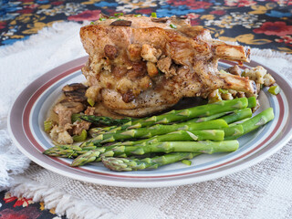 Stuffed Porkchop on Plate with Asparagus Horizontal