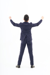 A man in a suit expressing joy