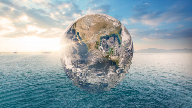 Planet Earth is floating over the ocean. Global warming, Travel Concept. (Elements of this image furnished by NASA)