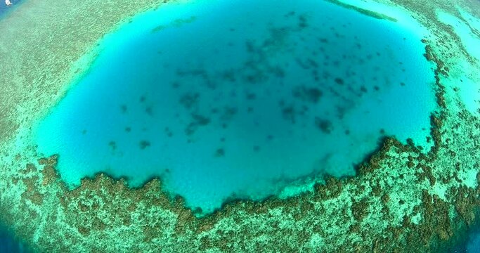 Aerial Drone Shot for Abu Nuhas Coral Reef Dive Site in `the Red Sea of Egypt. The reef is a navigation hazard because it projects into the shipping channel, as evidenced by seven shipwrecks.