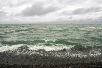 Stormy Black Sea on the Sochi coast on a cloudy day, Sochi, Krasnodar Territory, Russia