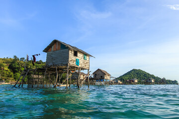 Beautiful landscapes view borneo sea gypsy water village in Bodgaya Mabul Island, Semporna Sabah, Malaysia.