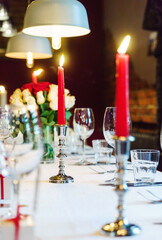 wedding table with red candles