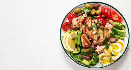 Tuna salad with lettuce, eggs and tomatoes.
