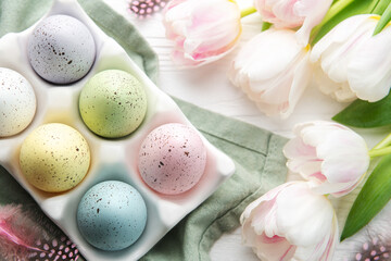 Holder with Easter eggs painted pastel colors on a white wooden background.