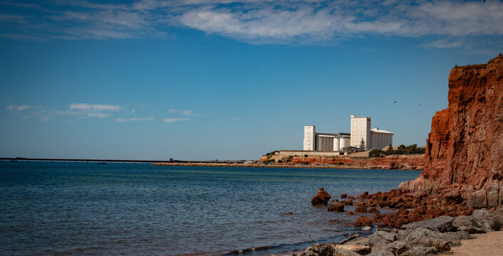 The view of the storage facility against the water and red sand at Ardrossan beach, Yorke Peninsula.