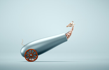 Giraffe preparing to fly shot from weapon cannon gun.