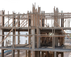 Walls and frame of a building under construction.